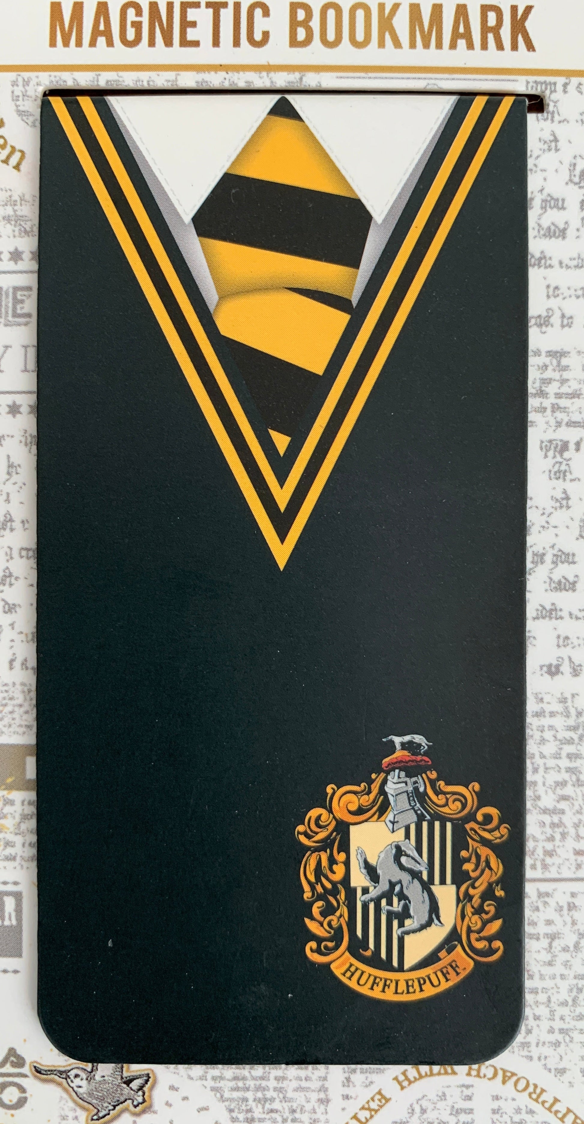 Magnetic bookmark with Hufflepuff crest design on a branded card
