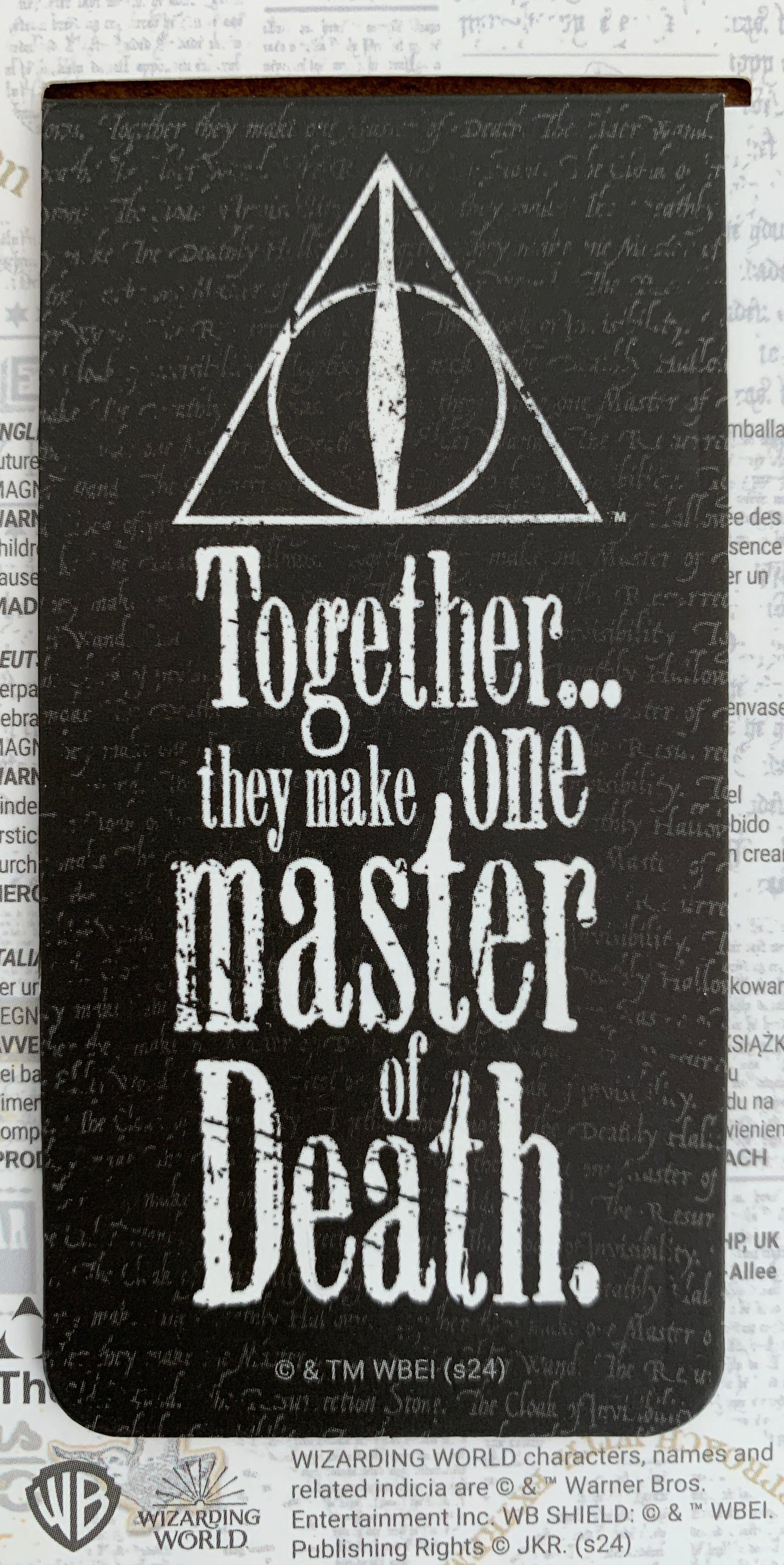 Bookend with Deathly Hallows symbol and text on a white background