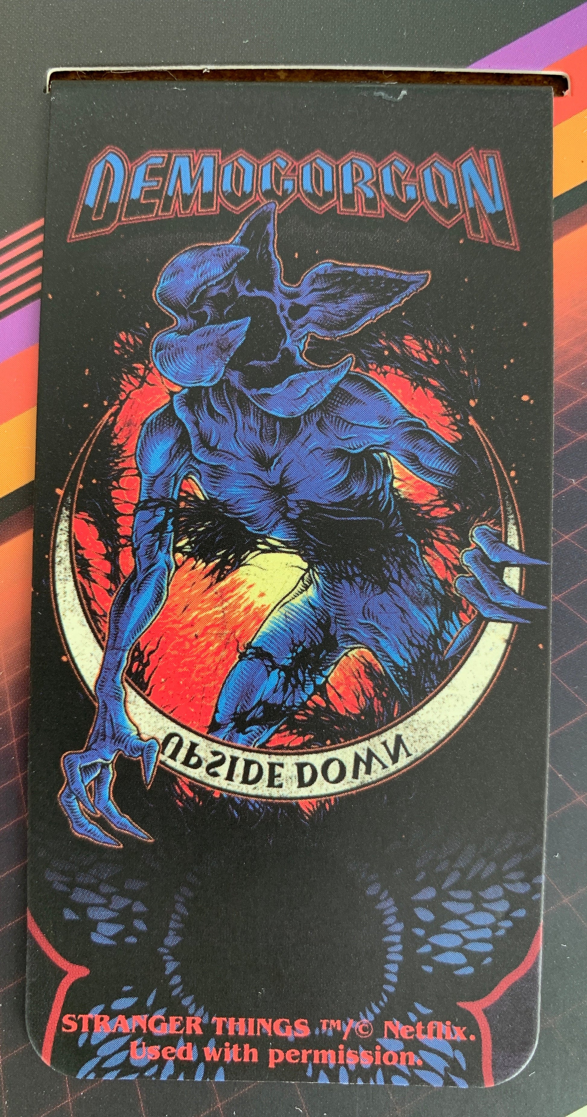 Card with a blue dragon design and text on a white background
