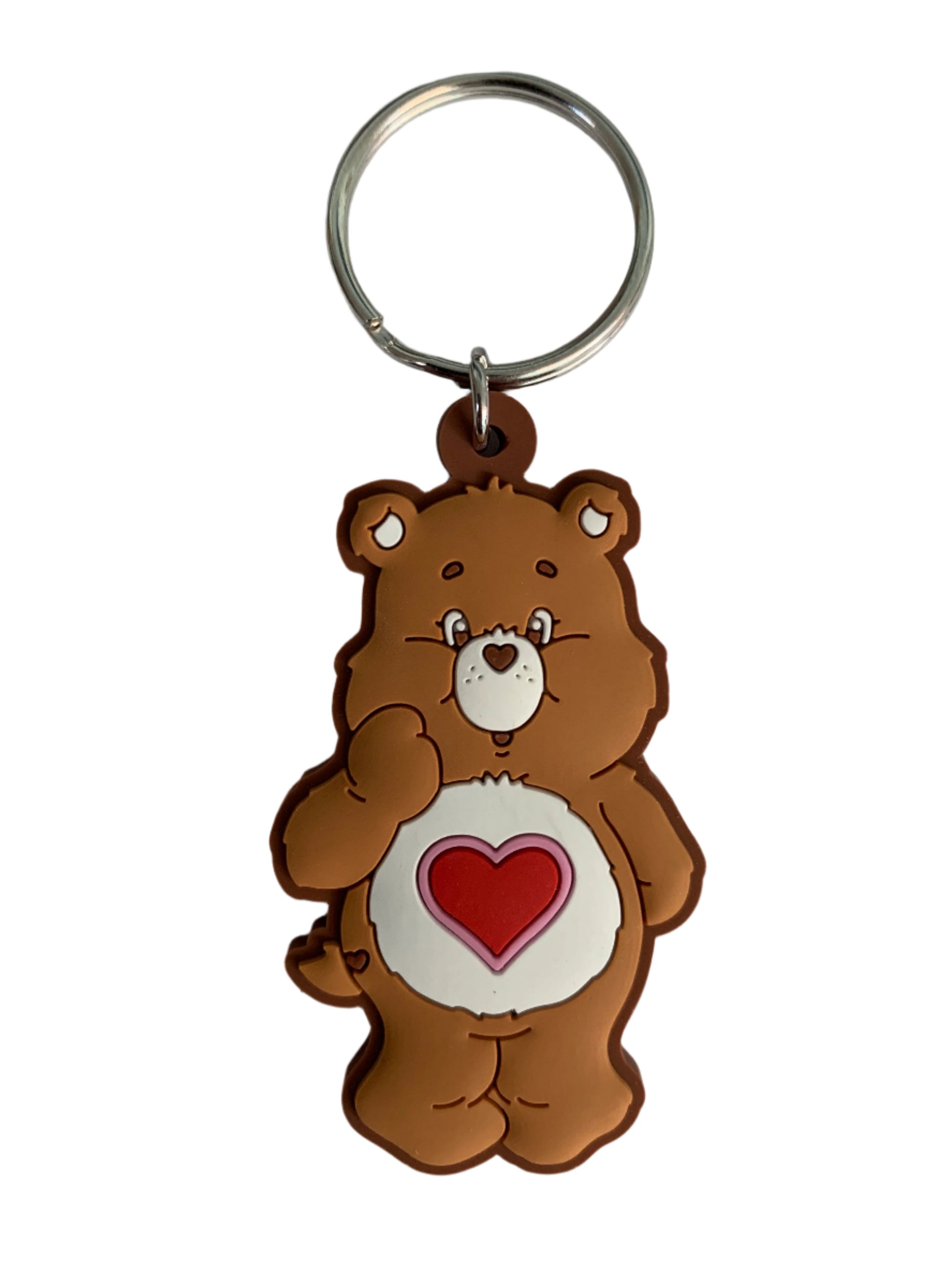 Brown bear-shaped keychain with a heart on a light white background