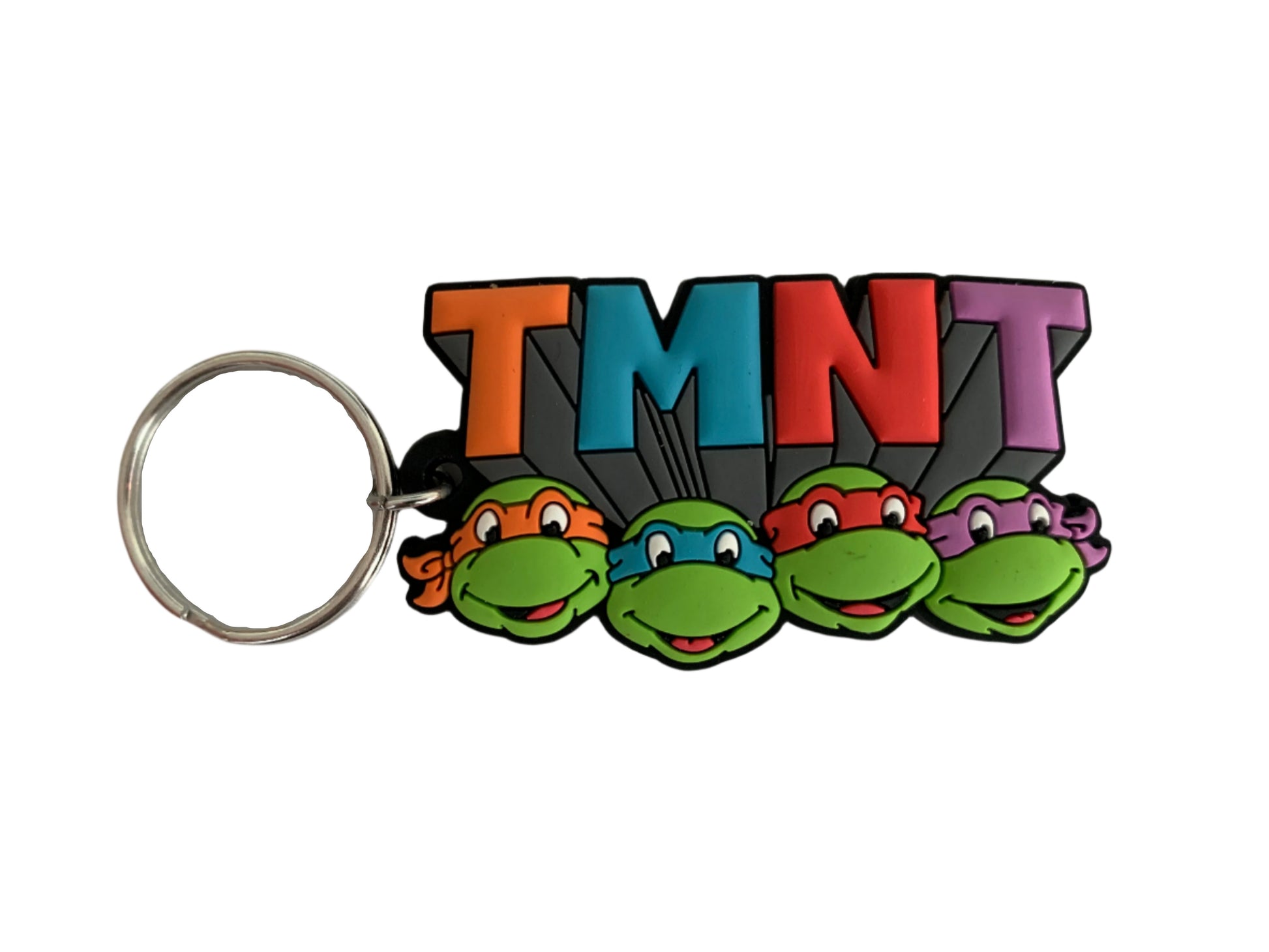 Keychain with 'TMNT' letters and cartoon turtles on a white background