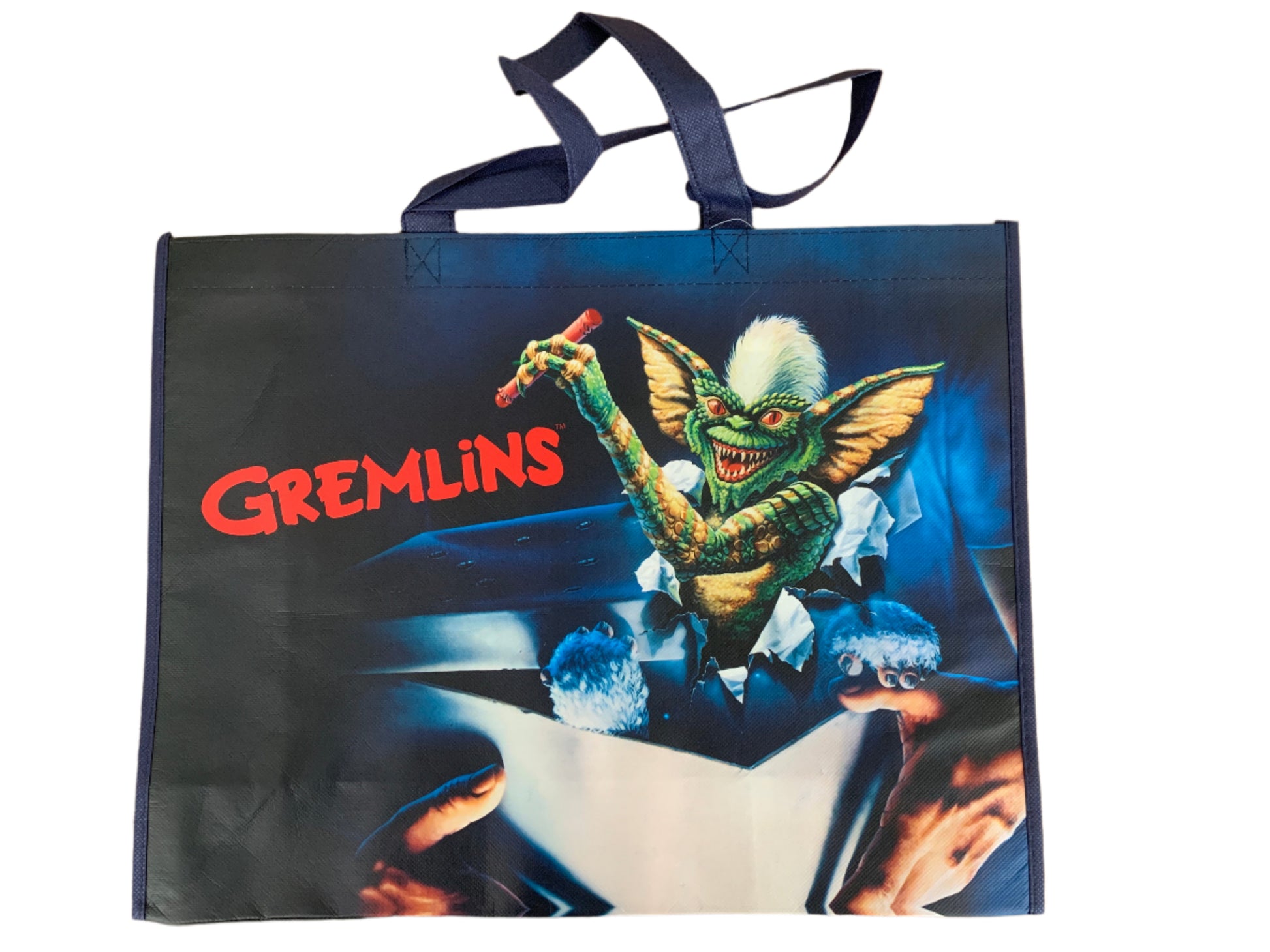 Tote bag with Gremlins character and text on a white background