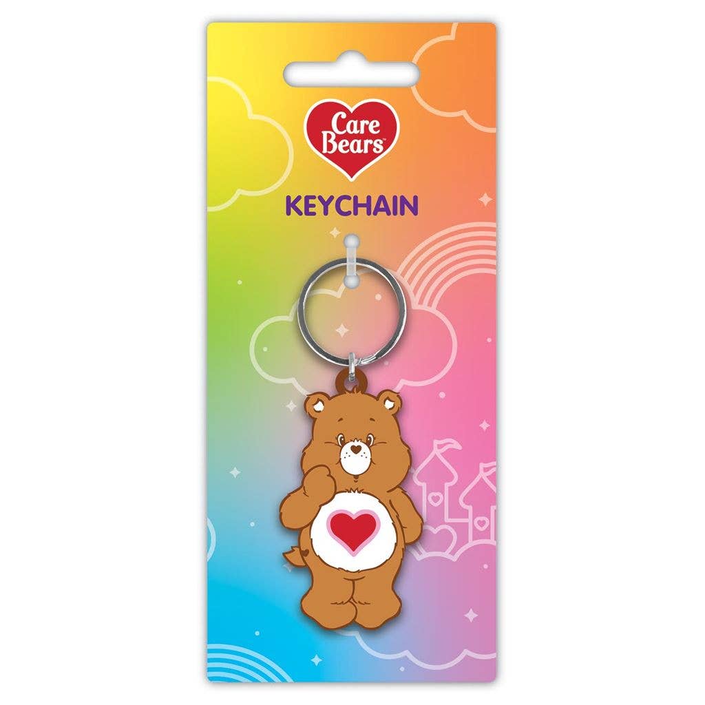 Care Bears keychain in a colorful package with a rainbow gradient.