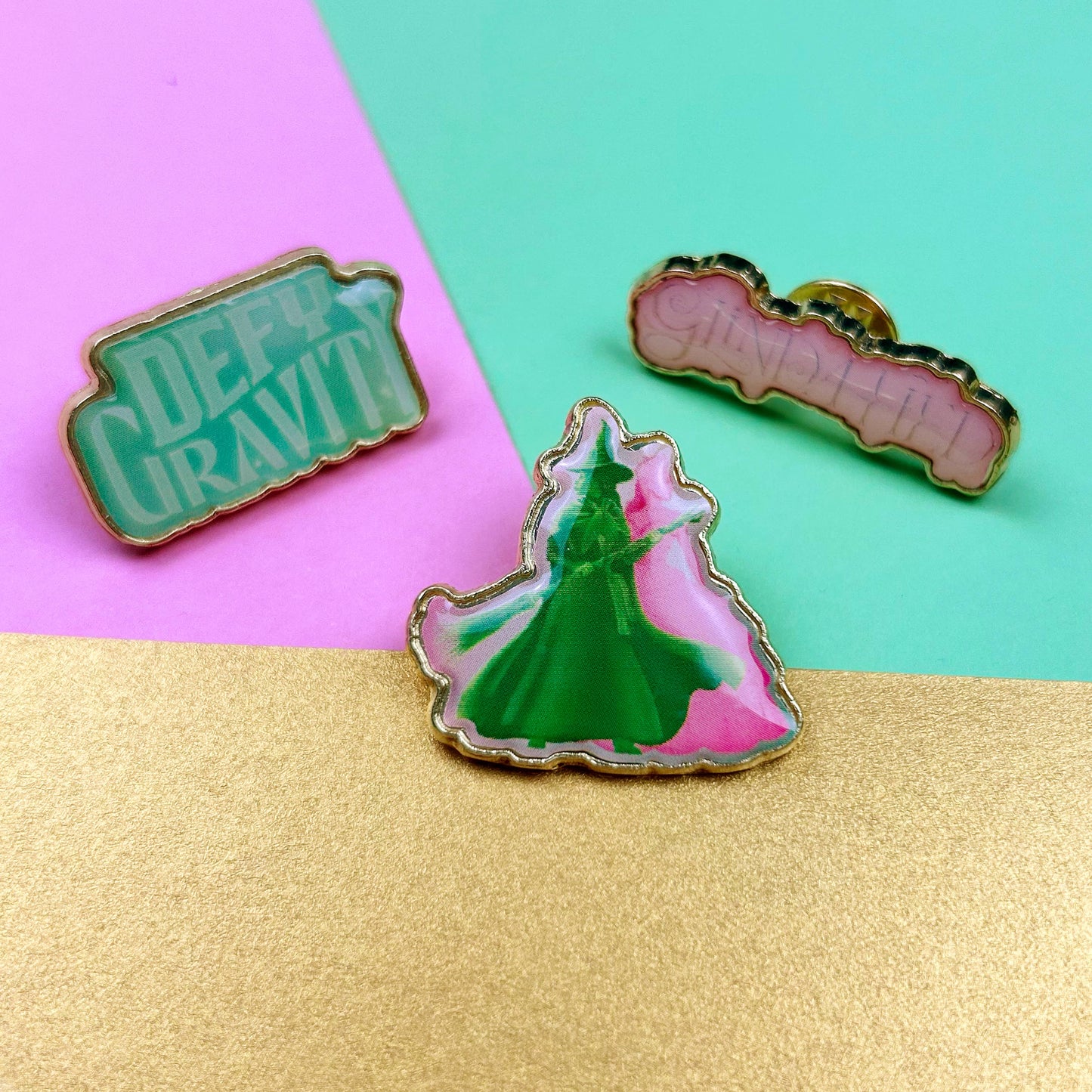 Wicked Officially Licensed Pin Badges Set – Glinda & Elphaba, "Defy Gravity", "Glinda-Fied"