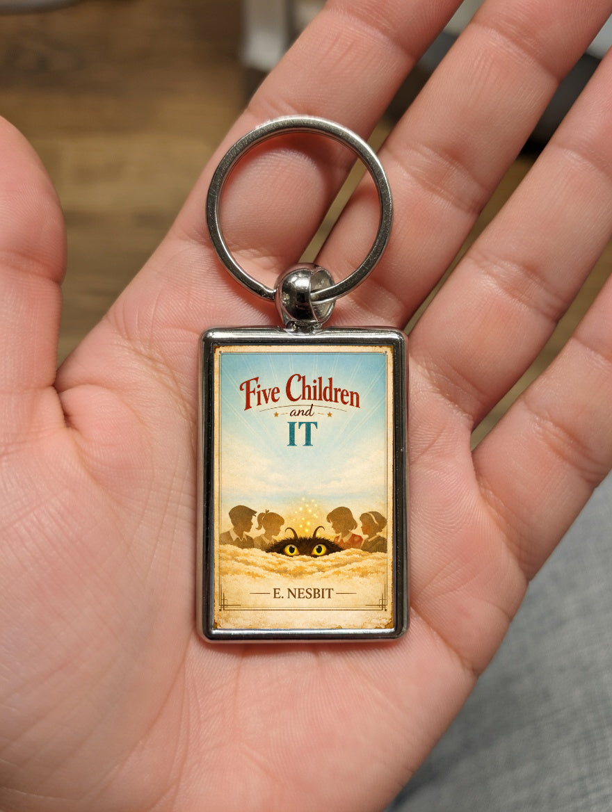 Five Children and It metal keyring shown in a hand for scale