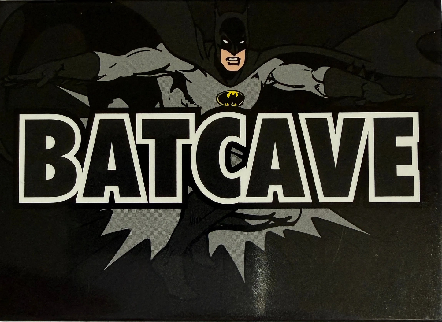 Batman logo with 'Batcave' text on a dark background