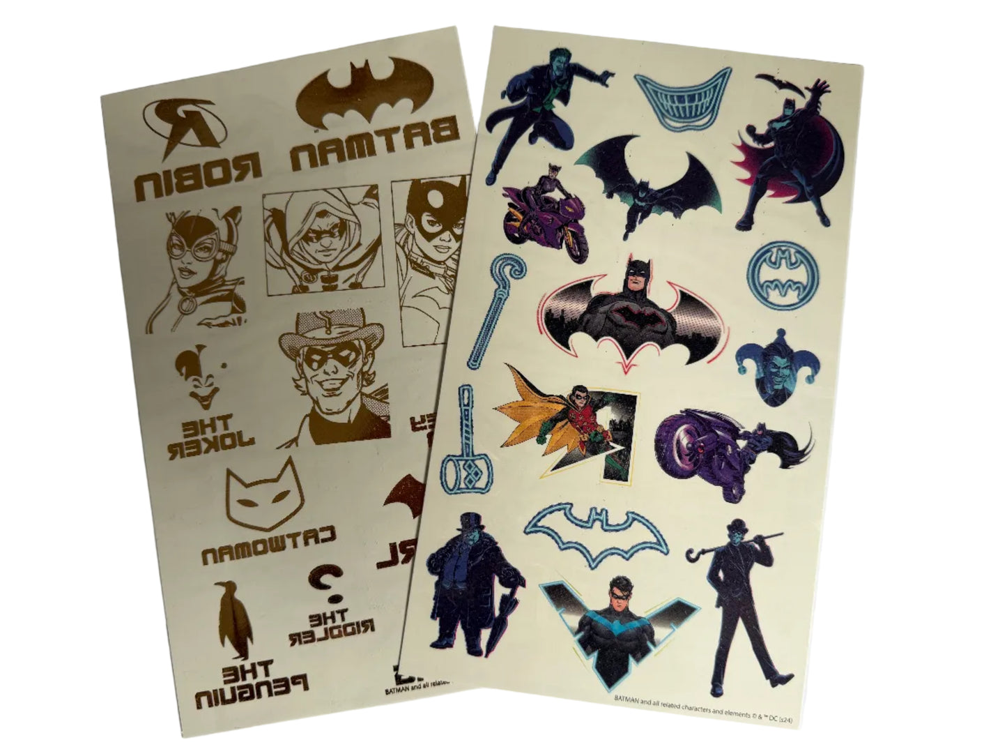 Sheet of superhero-themed tattoos on a white background