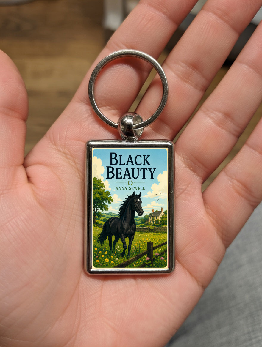 Black Beauty metal keyring shown in a hand
