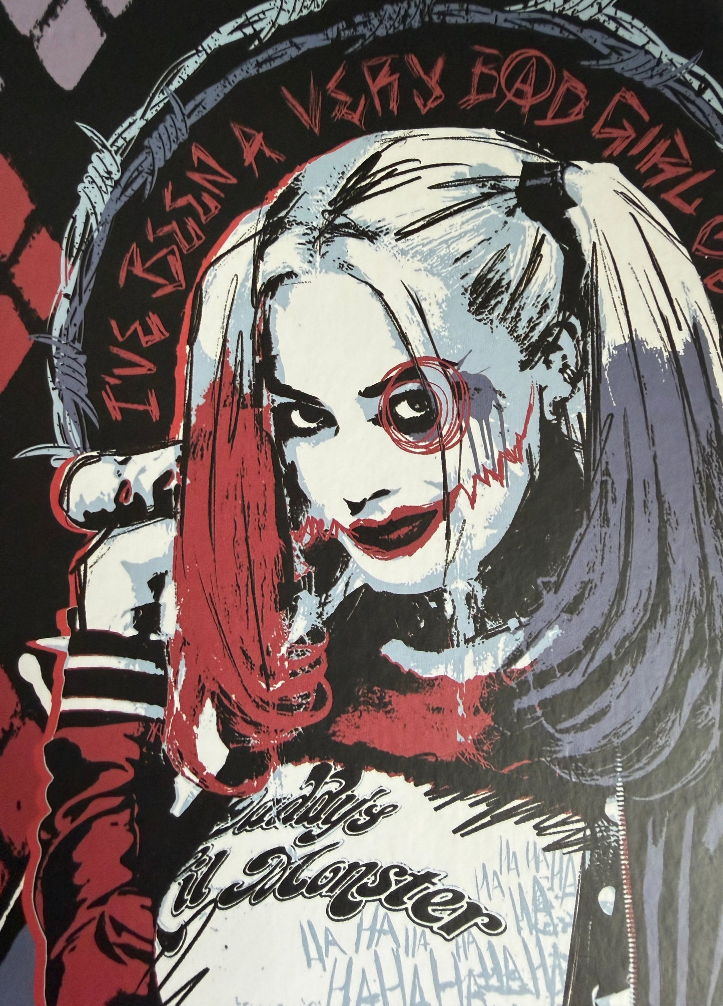 Illustration of a Harley figure with text and a red scarf on a black background
