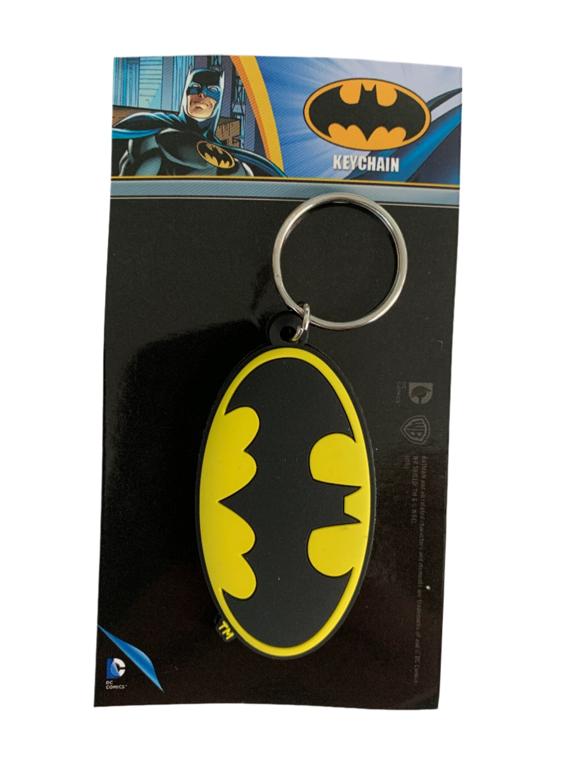 Batman keychain on a black card with packaging details