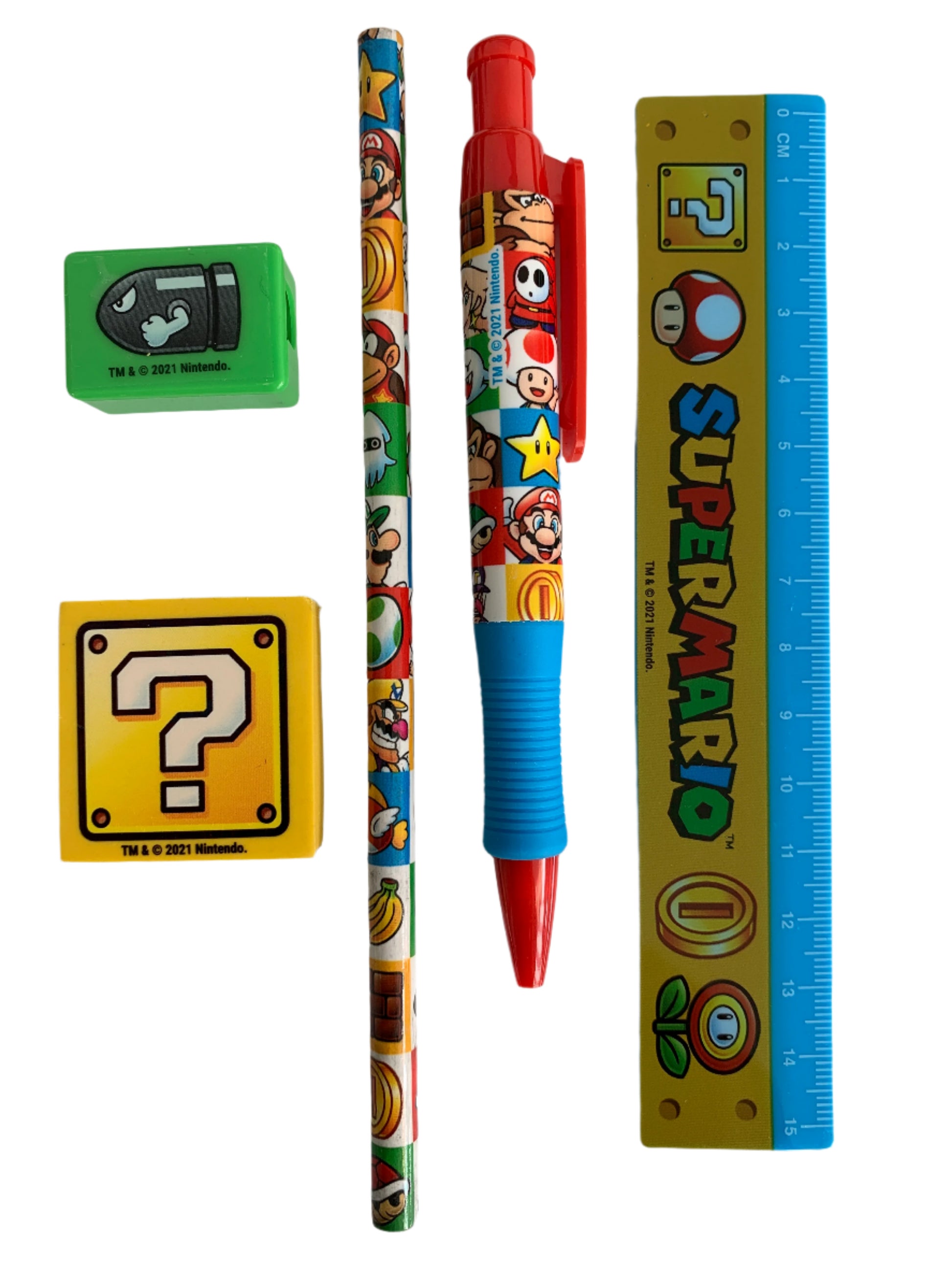 Super Mario-themed stationery items including a pen, ruler, eraser, and sharpener on a white background.