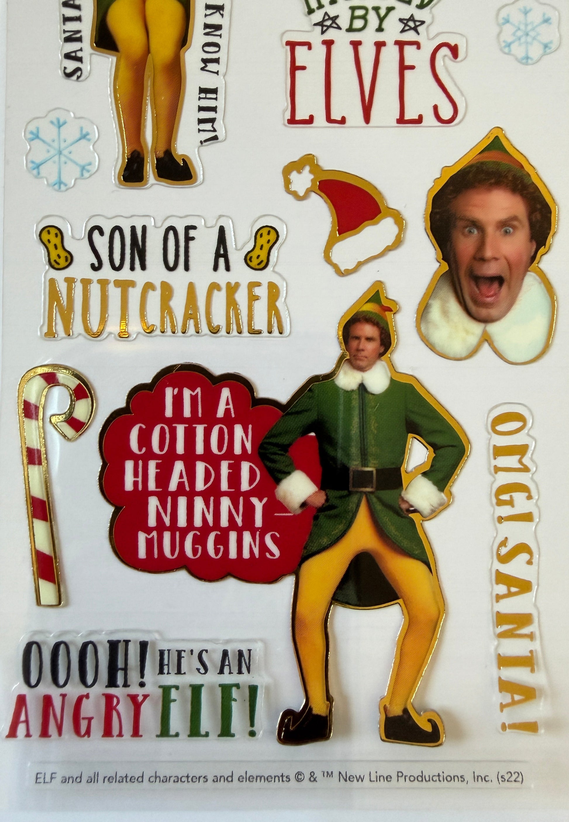 Close-up of Buddy the Elf stickers on backing card