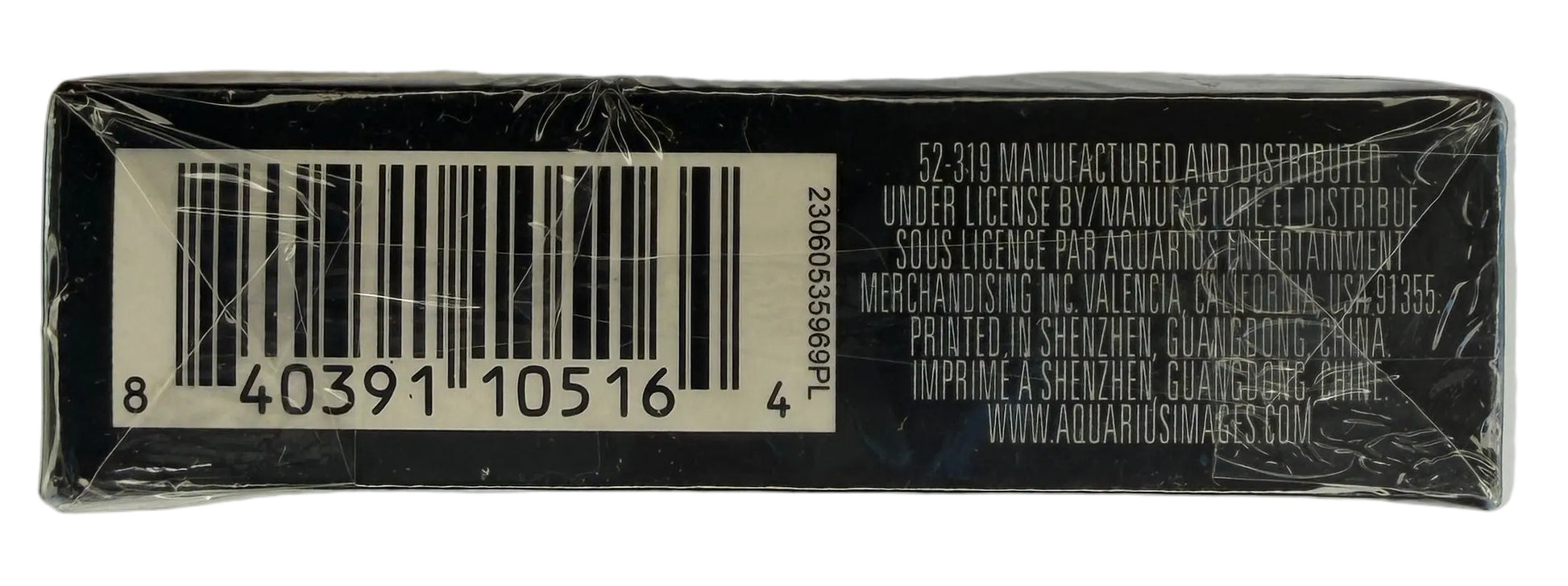 Product packaging with a barcode on a light gray background