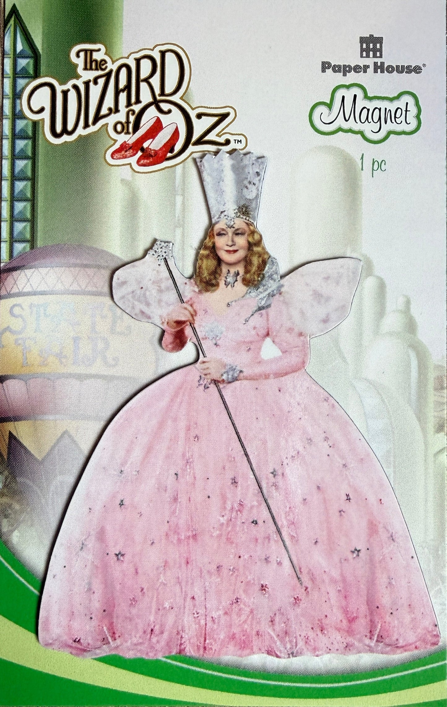 Cardboard cutout of a character from 'The Wizard of Oz' in front of a castle, with 'Paper House' branding.
