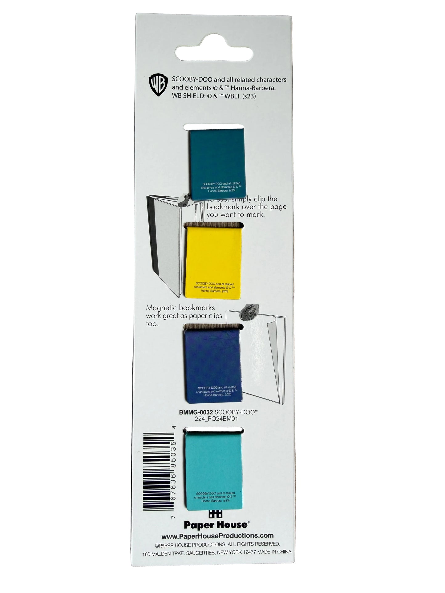 Packaging of magnetic bookmarks with a knife on a wooden surface
