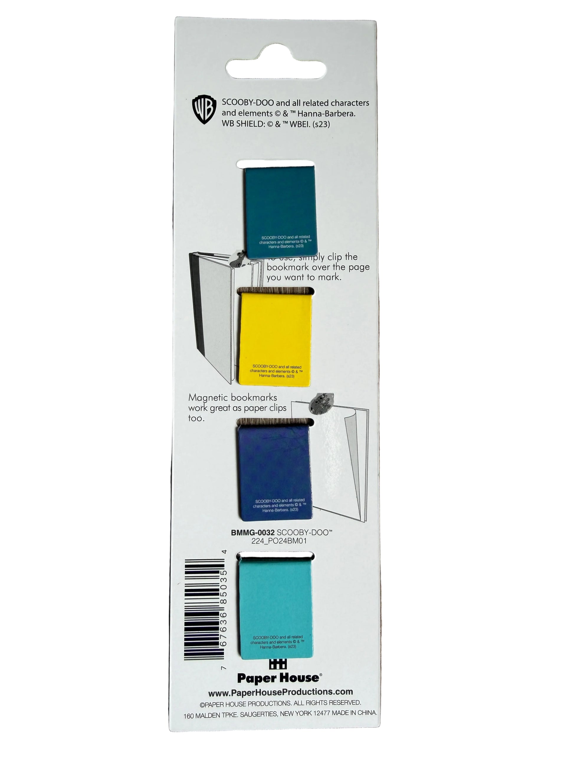 Packaging of magnetic bookmarks with a knife on a wooden surface