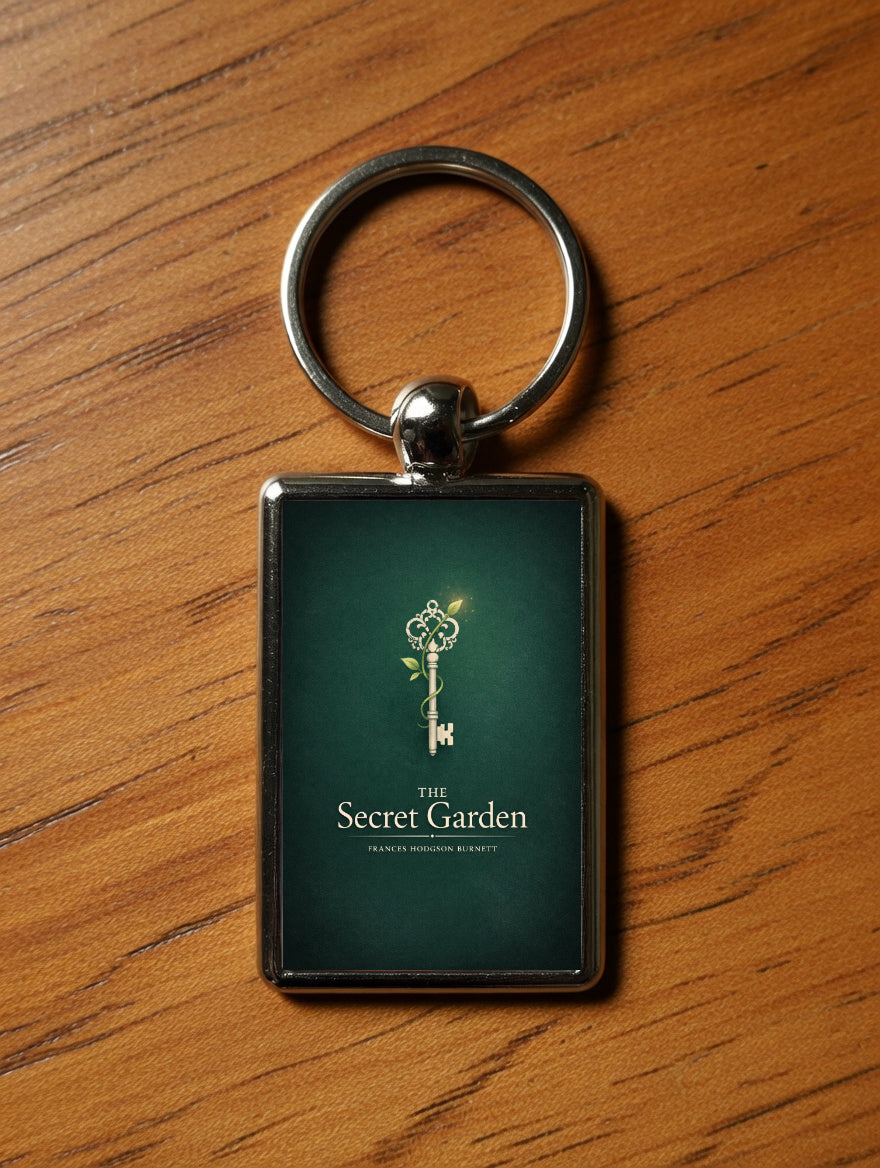The Secret Garden metal keyring on a wooden table