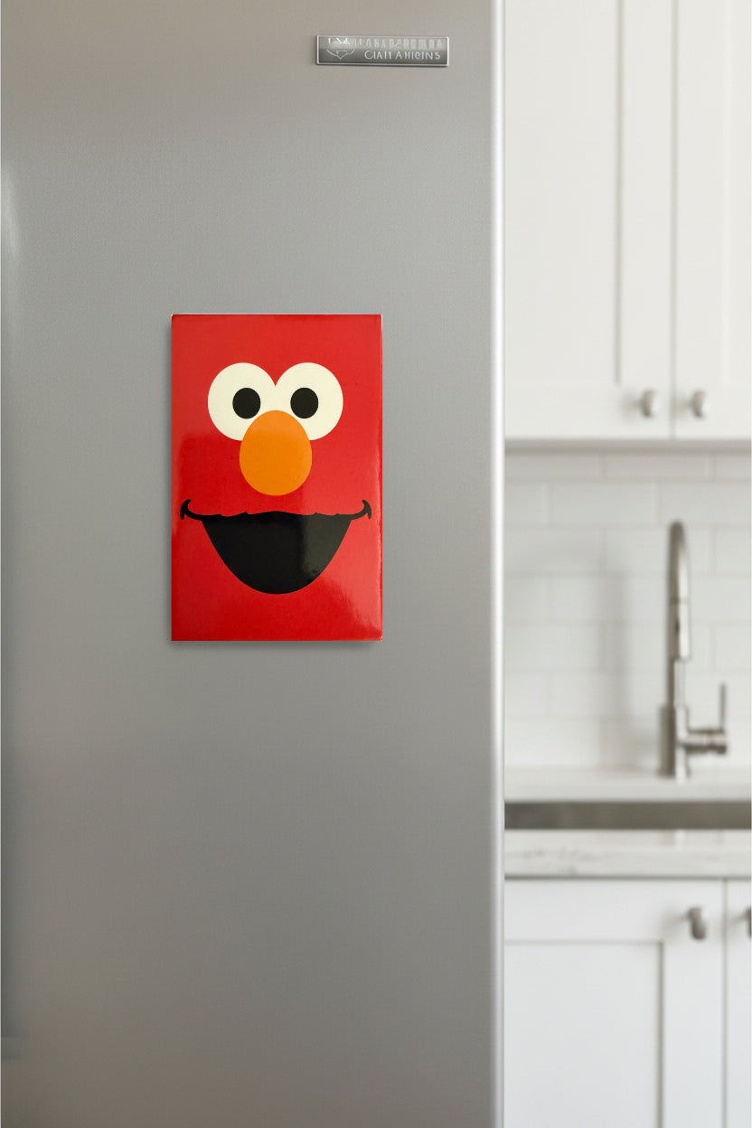 Elmo face on a refrigerator in a kitchen setting