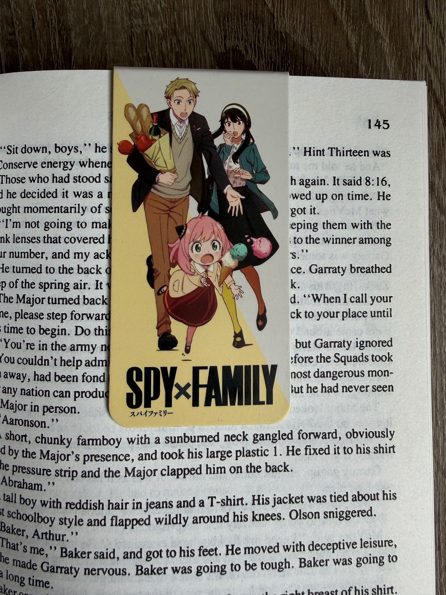 Comic-style card with 'Spy Family' design on a book page