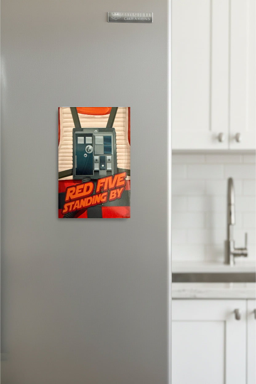 Fridge magnet with a vintage-style phone design on a refrigerator in a kitchen.