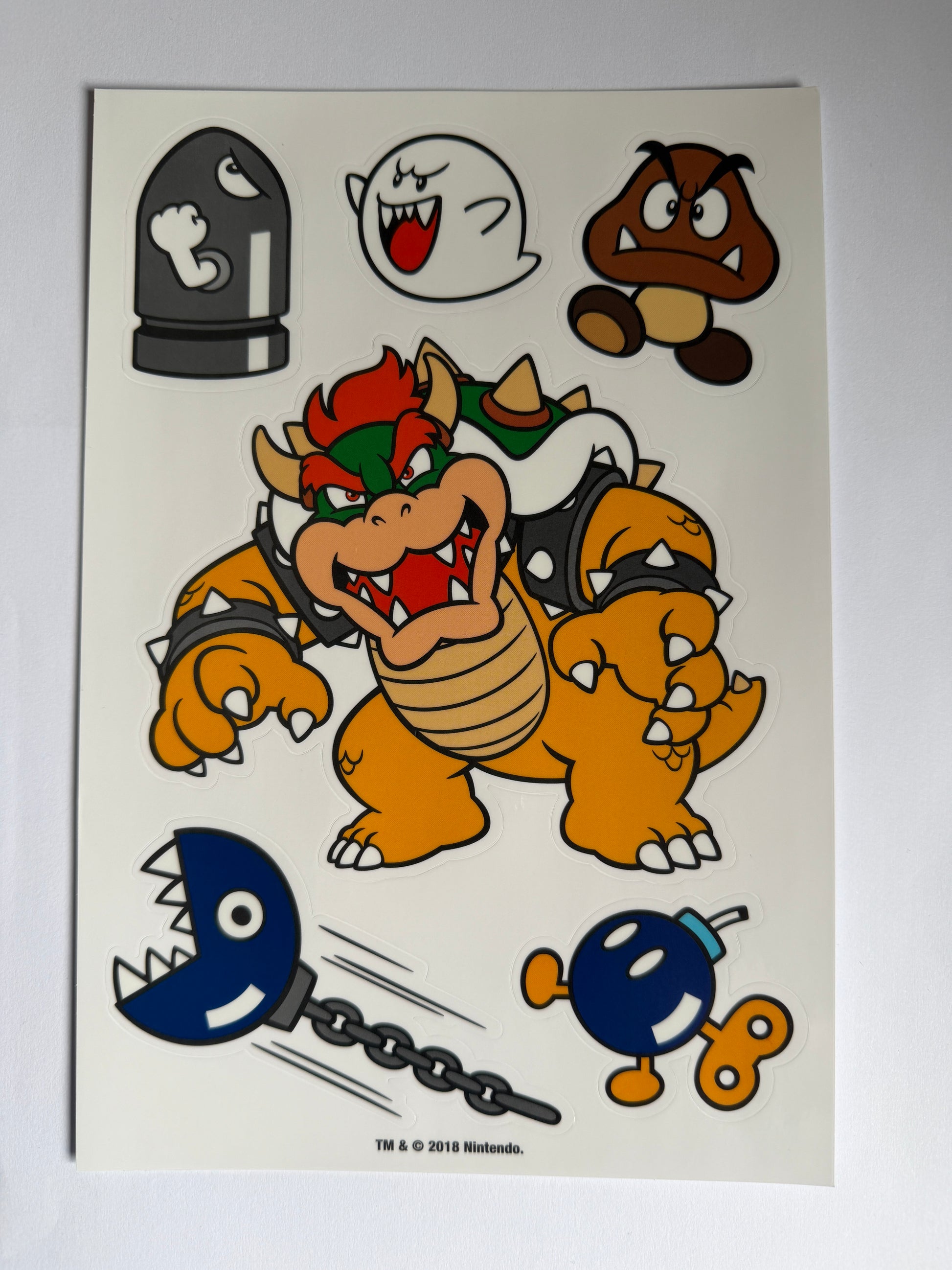 Cartoon character with various objects on a white background