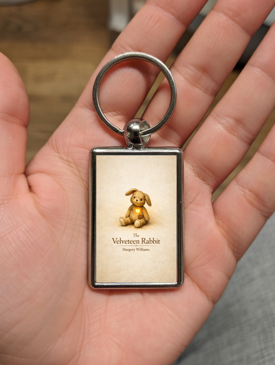 The Velveteen Rabbit metal keyring shown in a hand
