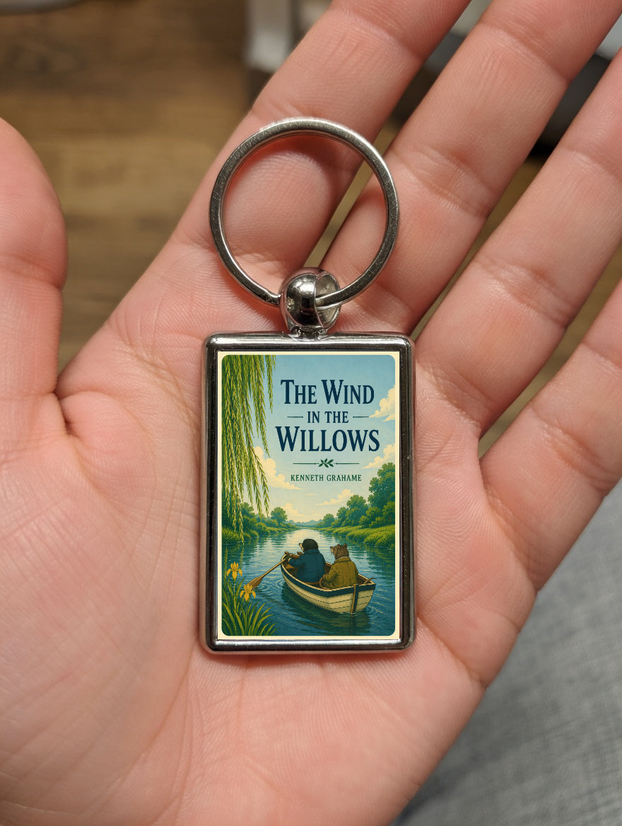 The Wind in the Willows metal keyring shown in a hand