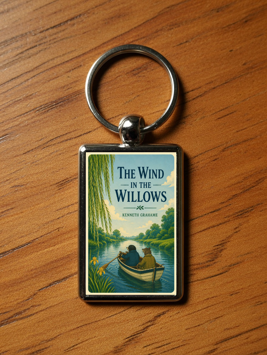The Wind in the Willows metal keyring on a wooden table