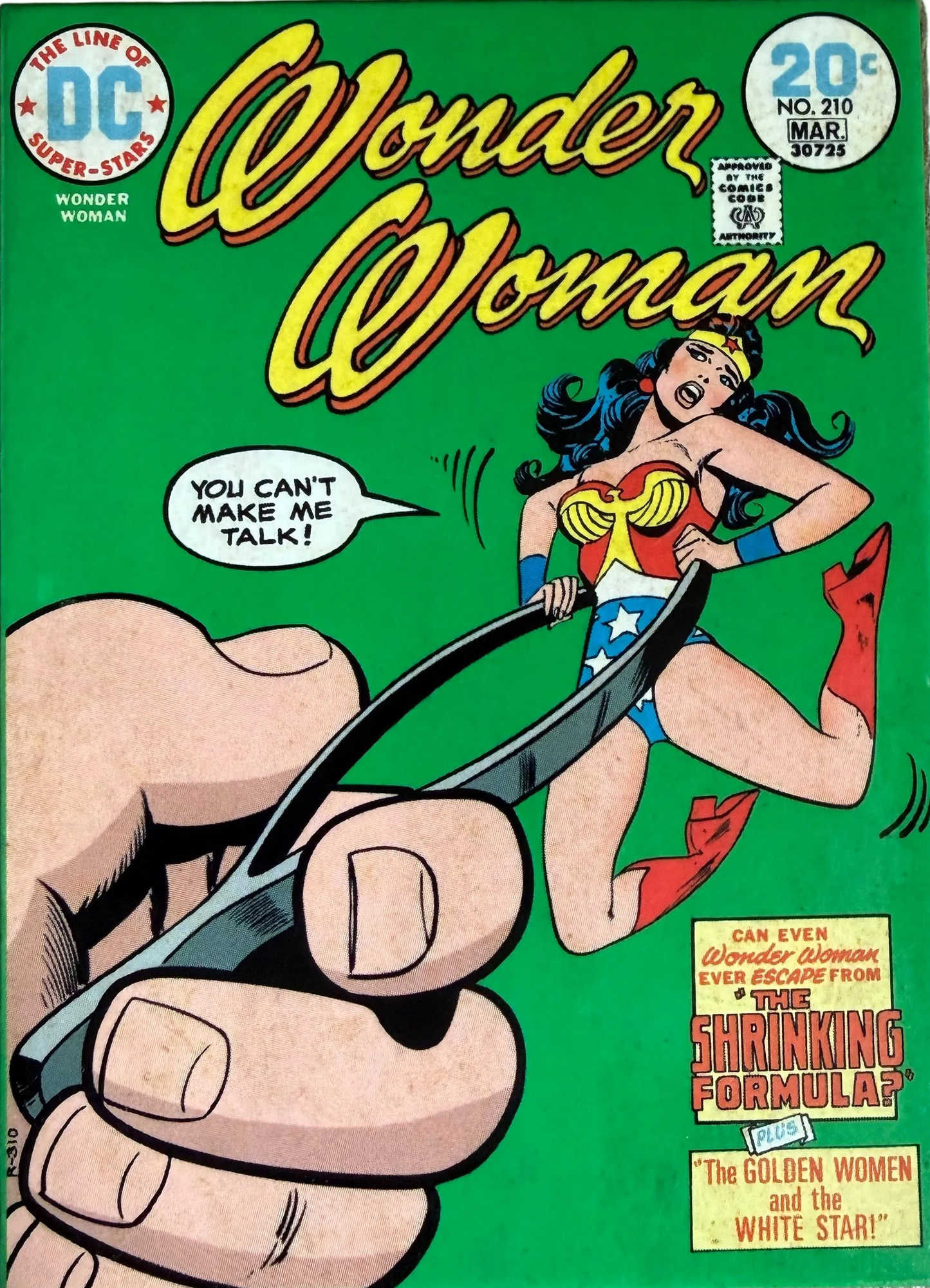 Comic book cover featuring Wonder Woman being held by a hand with a green background