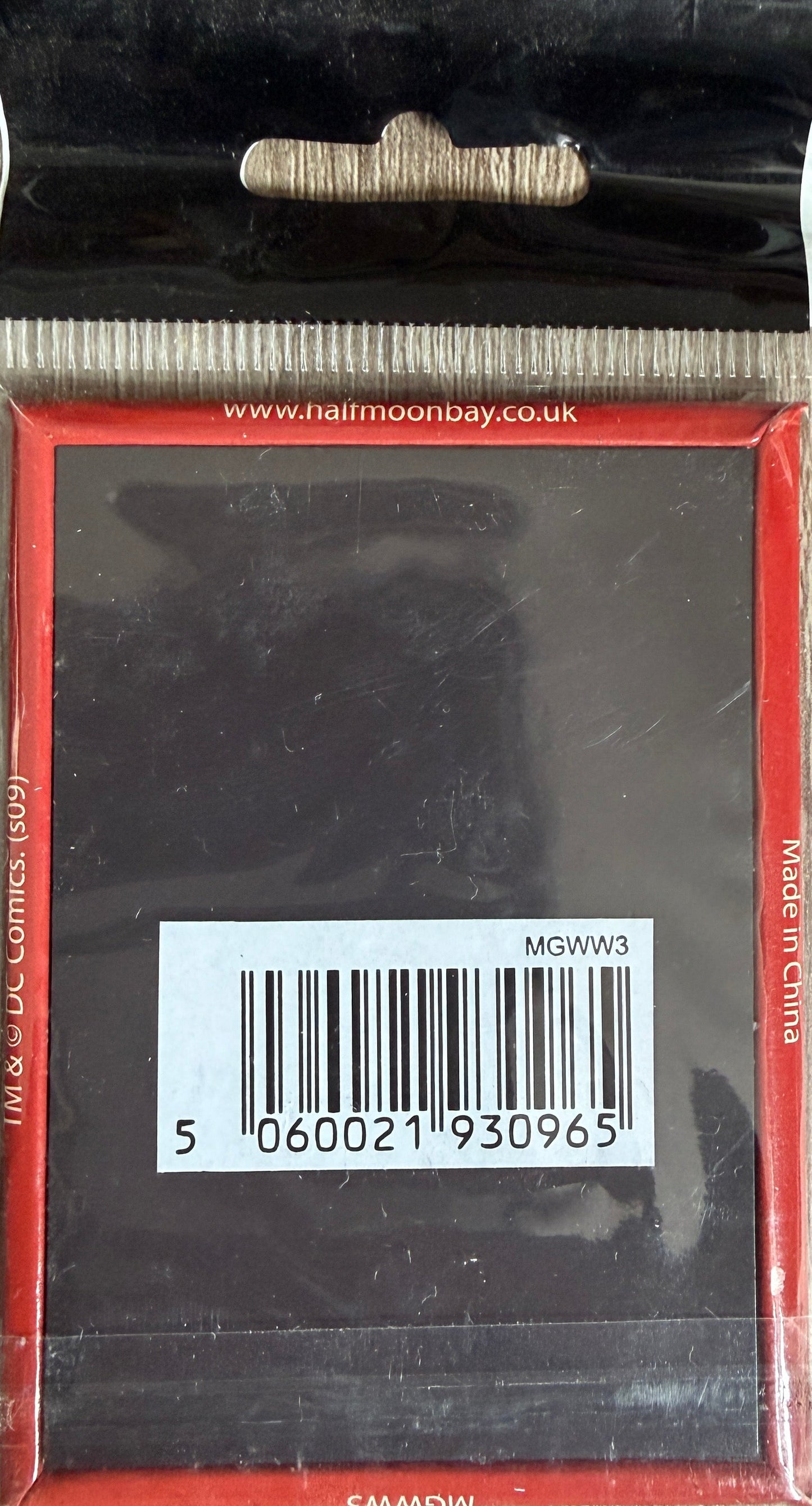 Product packaging with a barcode and 'Half Moon Bay' branding.