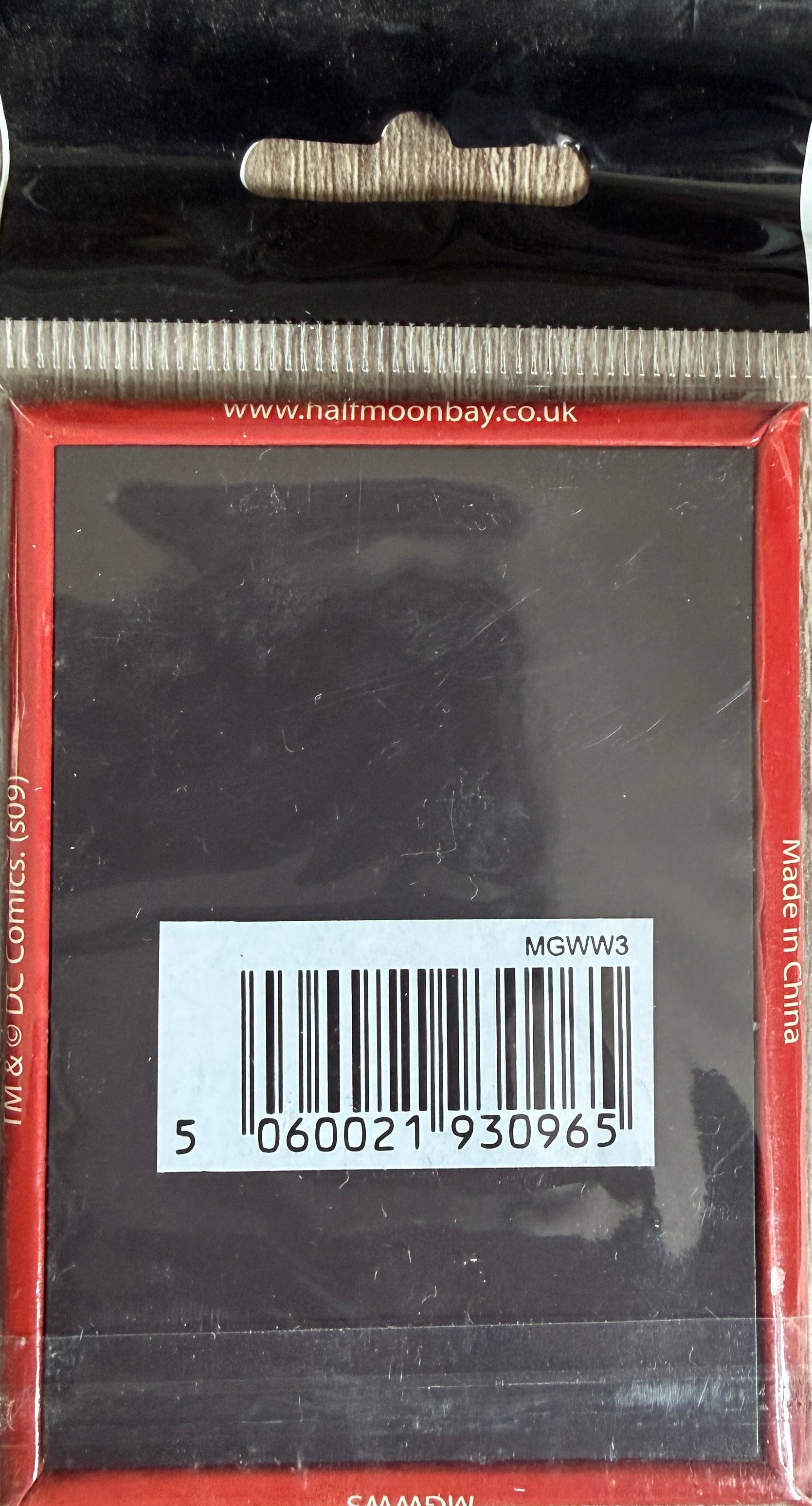 Product packaging with a barcode and 'Half Moon Bay' branding.