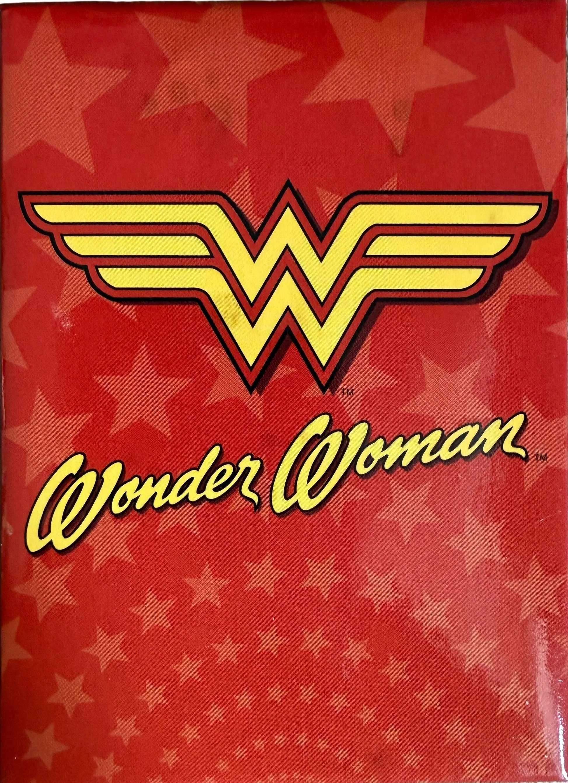 Red background with yellow 'Wonder Woman' logo