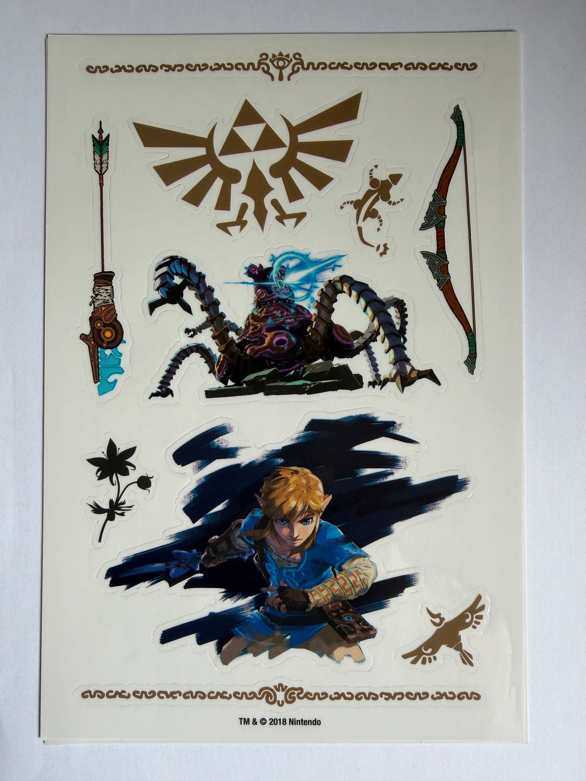 Sheet of stickers with fantasy-themed designs on a white background