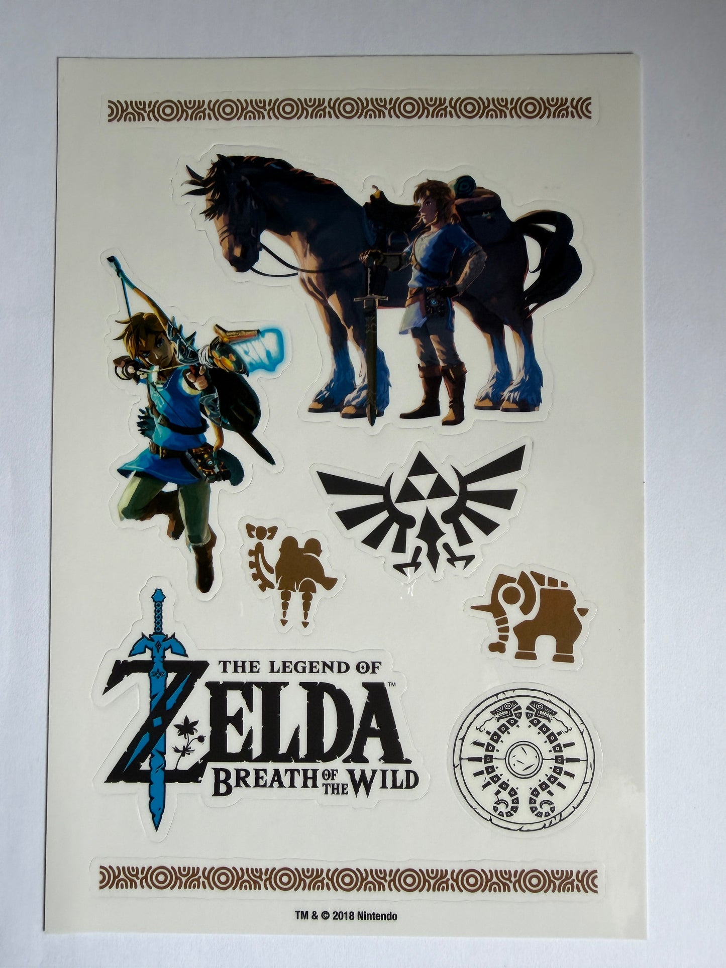 Sheet of 'The Legend of Zelda: Breath of the Wild' temporary tattoos with characters and symbols on a white background.