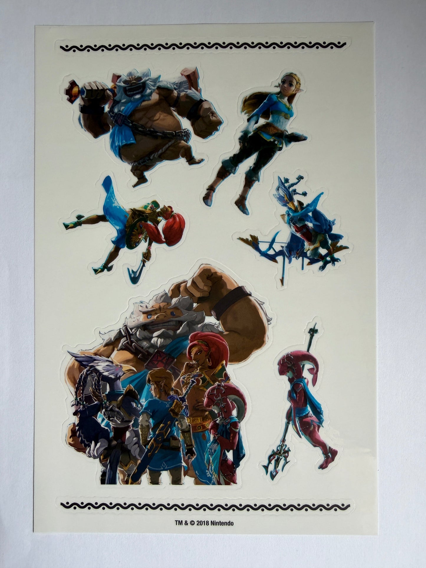 Collage of superhero figures on a beige background