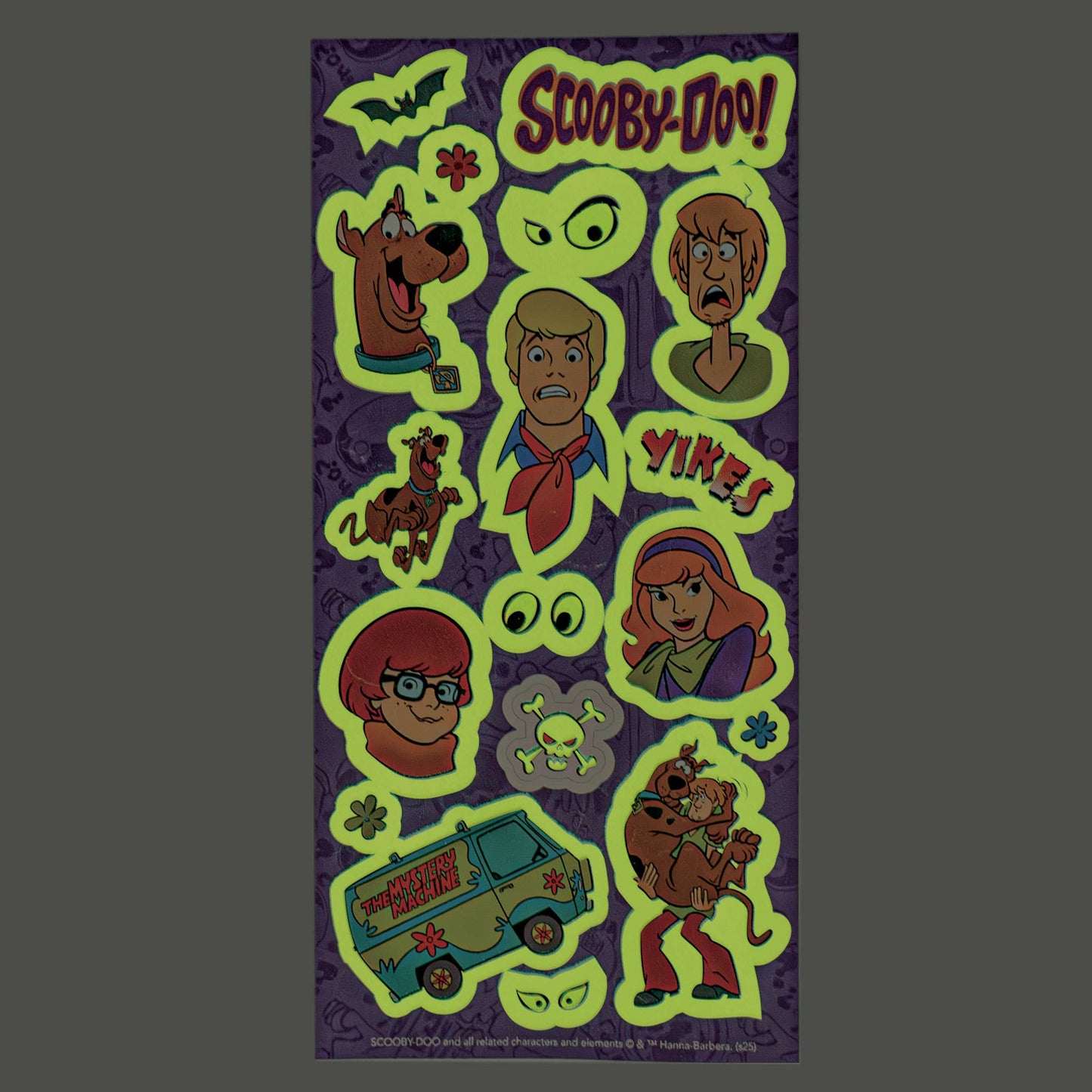 Close-up of glow ink Scooby-Doo stickers on sheet
